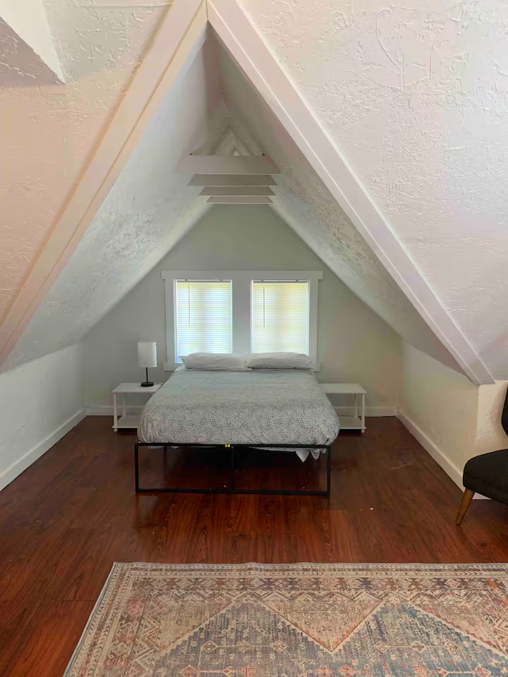 A-frame bedroom with natural light